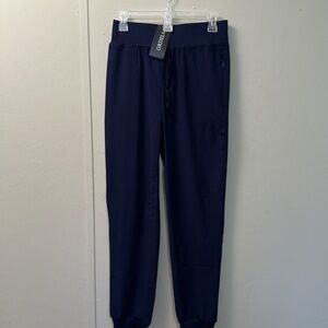 Grdela pants. Hidden zipper pockets. Cuffed at the bottom